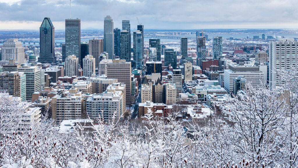 Quebec real estate market overview showing Montreal skyline with modern residential and commercial developments in 2026